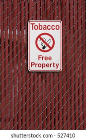 No Smoking - Tobacco Free Property Sign On School Fence