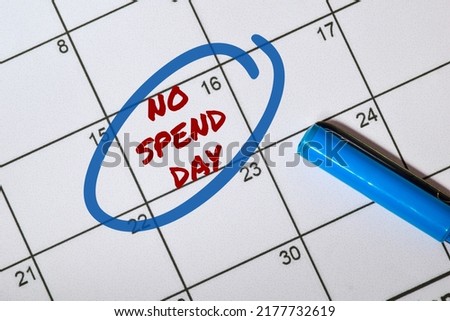 No Spend Day calendar reminder. Money saving concept.