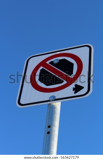 No Stopping Right\
of Sign Against Blue Sky