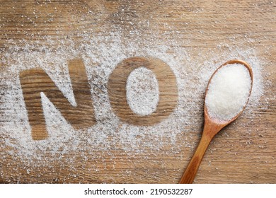 No Sugar. Flat Lay Composition With Refined Granules On Wooden Table