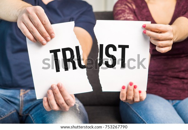 No trust.\
Cheating, infidelity, marital problems, having an affair and\
another partner, betrayal, mistrust or being unfaithful concept.\
Couple, man and woman, ripping same\
paper.