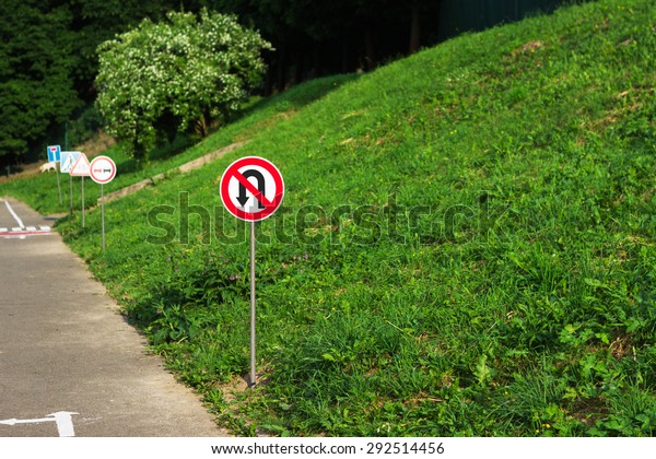 no turning back and other road signs on the
training kids track in the park
zone
