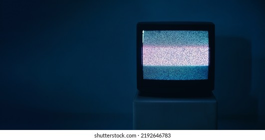 No TV signal on old television with copy space on dark background. Interference, television noise. Glitch Error. Video Damage - Shutterstock ID 2192646783