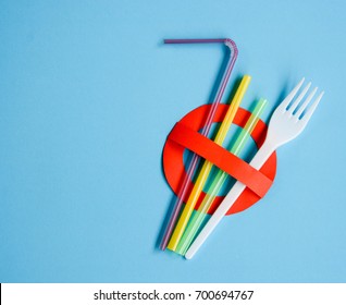 No use symbol in red with plastic straws and fork.  Plastic pollution is harmful to  marine lives. Environmental concept. Ban single use plastic campaign. - Shutterstock ID 700694767