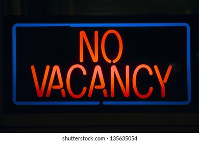 No Vacancy sign of a motel at night