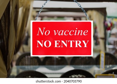 No Vaccine No Entry Sign At A Bar Or Pub.