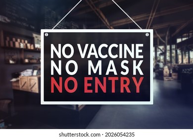 A no vaccine, no mask, no entry sign at a restaurant, cafe or other establishment. - Shutterstock ID 2026054235