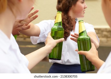 No. Young Female Student Turning Down Alcohol In Response To Peer Pressure.