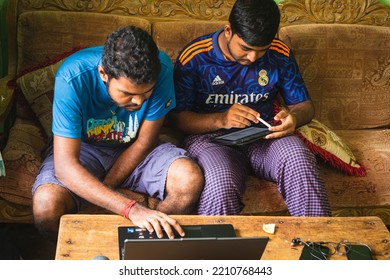 Noakhali, Bangladesh- September 30,2022 : South Asian Young Male Working With Laptop From Home. 