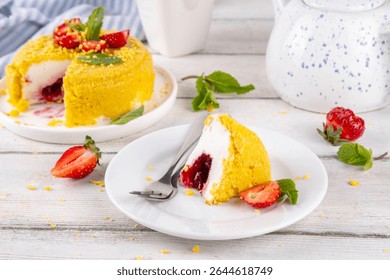 No-bake Upside Down Cheesecake, viral trendy version of classic Cheesecake New York with golden cookie crumbles, white cream cheese and berry jam layers, with fresh strawberry and mint on wooden table
