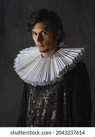 A Noble Young Man In An Old Suit With A Round Spanish Collar, A Portrait In The Style Of Renaissance Paintings