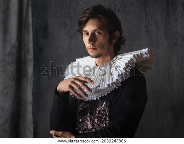 A noble\
young man in an old suit with a round Spanish collar, a portrait in\
the style of Renaissance\
paintings