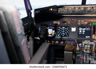 Nobody In Plane Jet Cockpit With Electronic Dashboard Control, Engine Throttle To Fly Aircraft. No People In Aviation Cabin With Radar Compass Navigation Lever And Panel Command Handle.