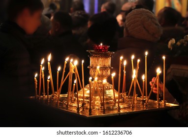 Nocturnal Christmas Service In A Russian Orthodox Church, Close-up Of Burning Candles