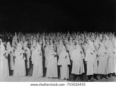 Nocturnal gathering of robed and hooded Ku Klux Klan men in 1921-1922. Photo by National Photo Company and was likely taken within 100 miles of Washington, D.C.
