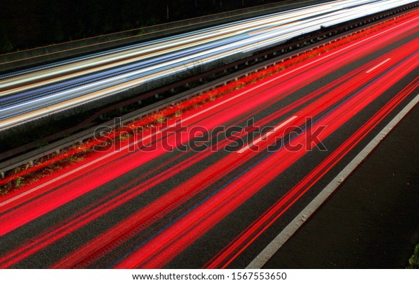 nocturnal light strips on a\
motorway