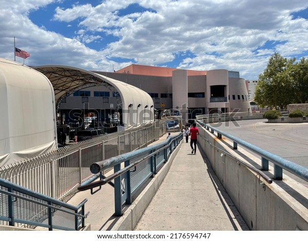 Nogales, Arizona, USA. July 8, 2022. US Mexico\
border in Nogales Arizona. People crossing the border at port of\
entry 5117.