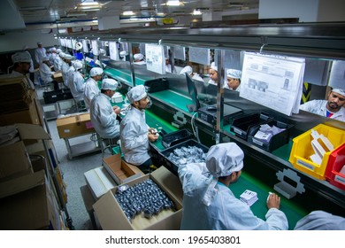 Noida, Uttar Pradesh, India- 23 October 2019: Group Of Technician And Engineer Working In Mobile Manufacturing Factory At Noida, India. High Tech Factory.