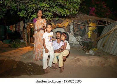 Noida, Uttar Pradesh, India, June 6 2013; Poor Family Outside Of  His Small Hut In Slum Dwelling Area, 