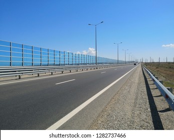 Noise Barrier On The Road.