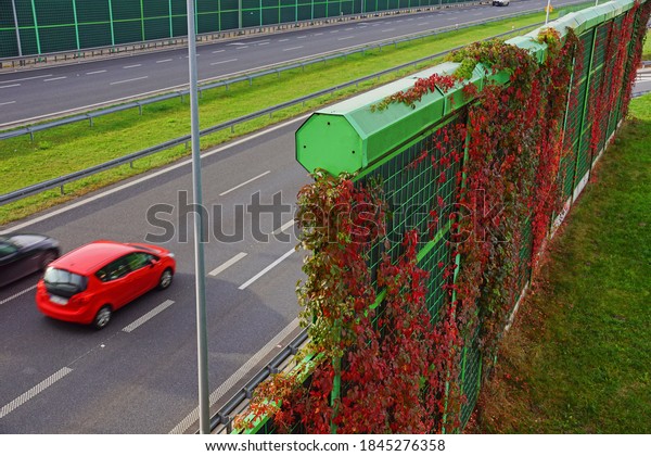 Noise barriers on the motorway. Barriers\
protect local residents from traffic\
noise.
