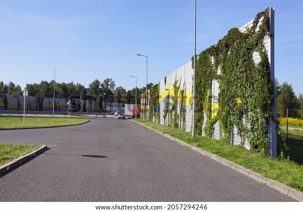  Noise barriers on the motorway.\
Barriers protect local residents from traffic\
noise.