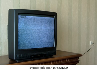 Noise Image Of Old Vintage Tv With Blank Screen On Wooden Retro Stand Side View