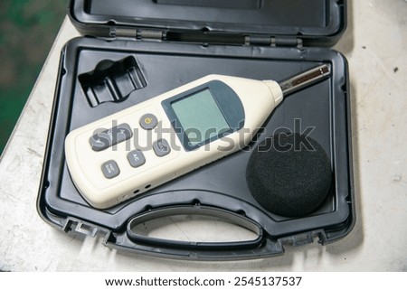 noise, test, meter, work, background, decibel, sound, white, safety, gauge, level, ear, technology, isolated, music, hand, digital, black, red, study, electronic, tool, prevention, device, audio, inst