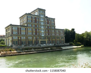 Noisiel, Seine Et Marne/France - 07/26/2018 : Industrial Building Of The Old Chocolate Factory Menier On The Marne Near Paris.