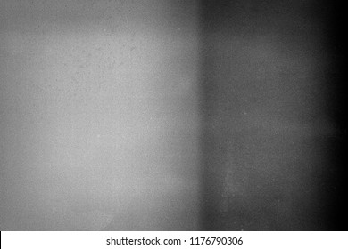 Noisy Film Frame With Heavy Noise, Dust And Grain. Abstract Old Film Background