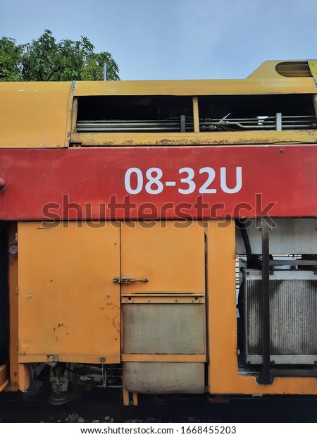 a noisy photo of train locomotive for maintenance\
namely \