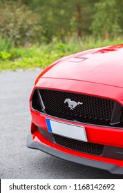 NOKIA, FINLAND - August 26:  Ford Mustang grill with running horse logo. Pony car. Image taken in Nokia, Finland on August 26, 2018. - Shutterstock ID 1168142692