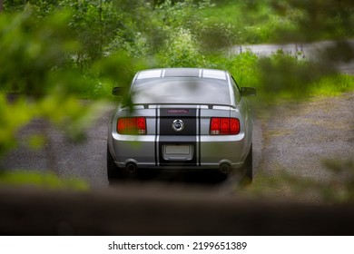 Nokia, Finland - June 22 2022. American Muscle Car Ford Mustang. Iconic And Legendary V8 Super Car With Black Stripes And High Horsepower. Gt Model Is Eight Cylinder Engine.