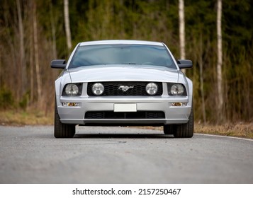 Nokia, Finland – May 9 2022: Classic American Muscle Car Ford Mustang Parked Outdoors. Iconic And Legendary Classic Sports Car With Lots Of Horsepower And High Consumption V8 Engine.