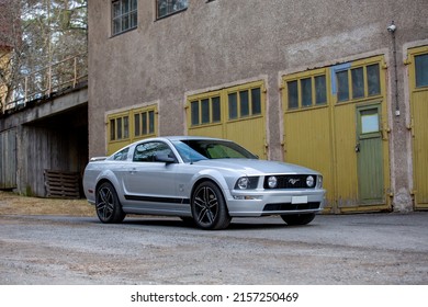 Nokia, Finland – May 9 2022: Classic American Muscle Car Ford Mustang Parked Outdoors. Iconic And Legendary Classic Sports Car With Lots Of Horsepower And High Consumption V8 Engine.