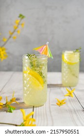 Non Alcoholic Refreshing Lemonade Cocktail With Thyme. Colourful Yellow Summer Mocktail. 