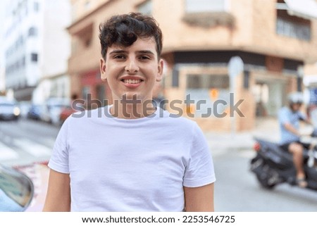 Non binary man smiling confident standing at street
