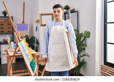 Non Binary Person At Art Studio Thinking Attitude And Sober Expression Looking Self Confident 