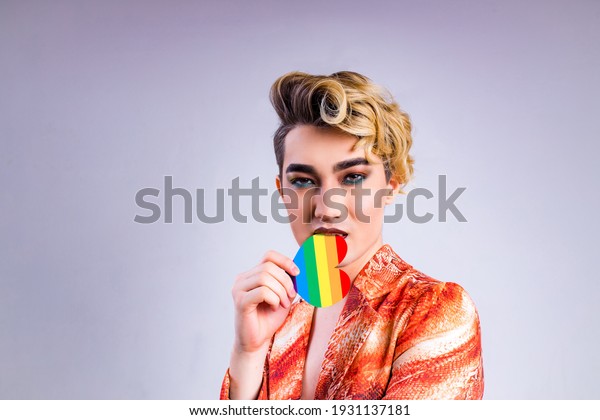 Non Binary Portrait Of Asian Man With Luxurious Blonde Hair And