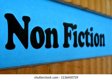 Non Fiction Sign Background. Literature Comprising Works Of Narrative Prose Dealing With Or Offering Opinions Or Conjectures Upon Facts And Reality, Including Biography, History And The Essay.