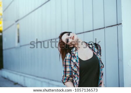 Similar – Young redhead woman listening to music