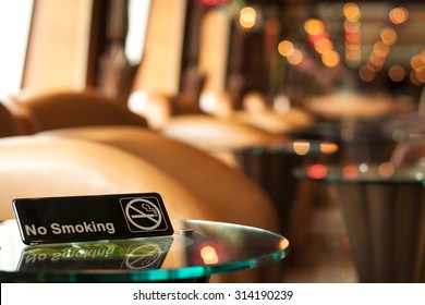 Non Smoking Sign On A Table In A Cafe