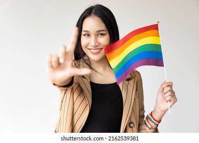 Non-binary LGBT Person Showing L Hand Sign For LGBT Awareness Pride Month