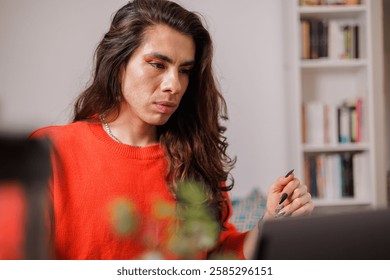 Non-binary person working from home