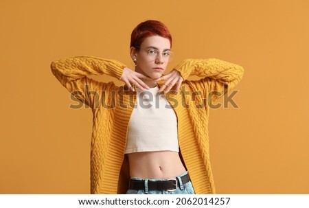 Non-binary teenager on color background