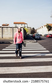 Nonconformist Young Rebel Genderfluid Woman Afab Skater Walking Outdoor 