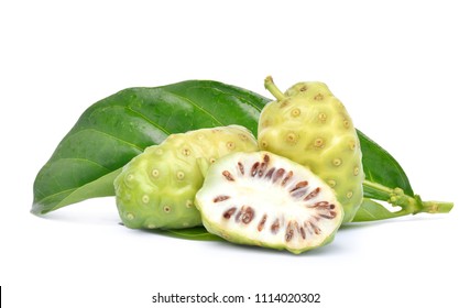Noni or Morinda Citrifolia fruits with half sliced and green leaf isolated on white background (Rubiaceae Noni, great morinda, indian mulberry, beach mulberry, cheese fruit, Gentianales)