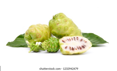 Noni or Morinda Citrifolia fruits with sliced and green leaf isolated on white background (Rubiaceae Noni, great morinda, indian mulberry, beach mulberry, cheese fruit, Gentianales)