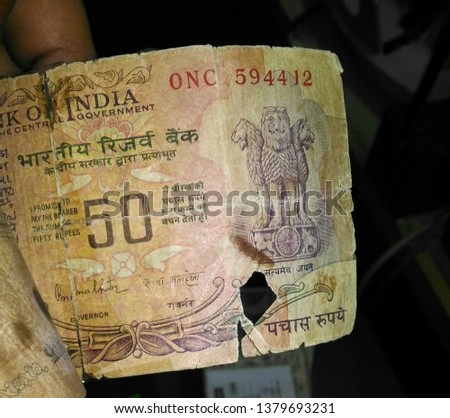 Non-issuable mutilated Rupees 50 notes