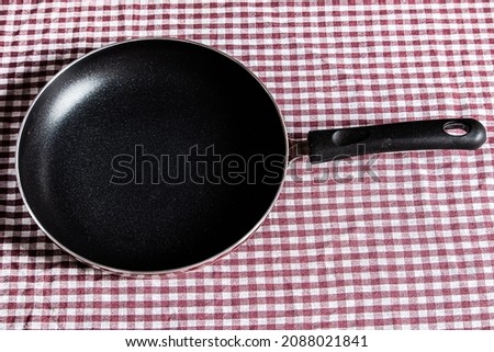 Similar – empty black round cast-iron frying pan